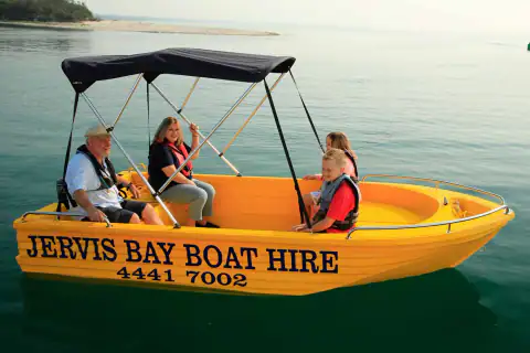 Family aboard a self-drive Jervis Bay Boat Hire runabout